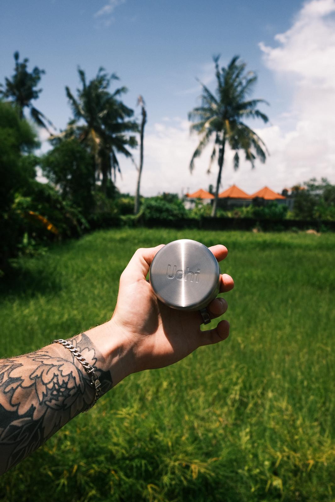 Uchi Base held in hand for scale. Matcha canister and storage, aesthetic design