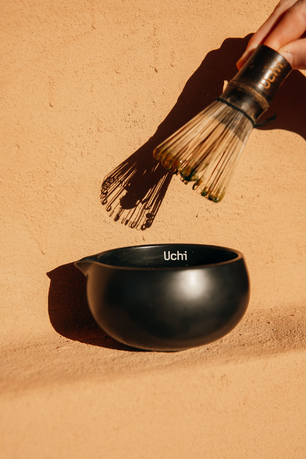 Matcha being whisked in the Uchi Bowl