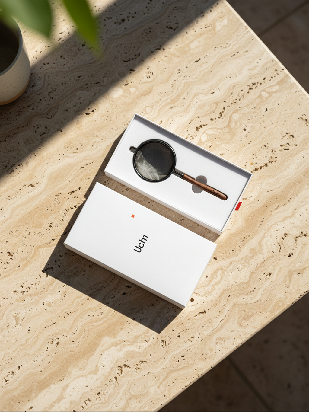 Uchi Sieve, fine mesh matcha sieve with wooden handle made for sieving matcha green tea. Travertine kitchen background