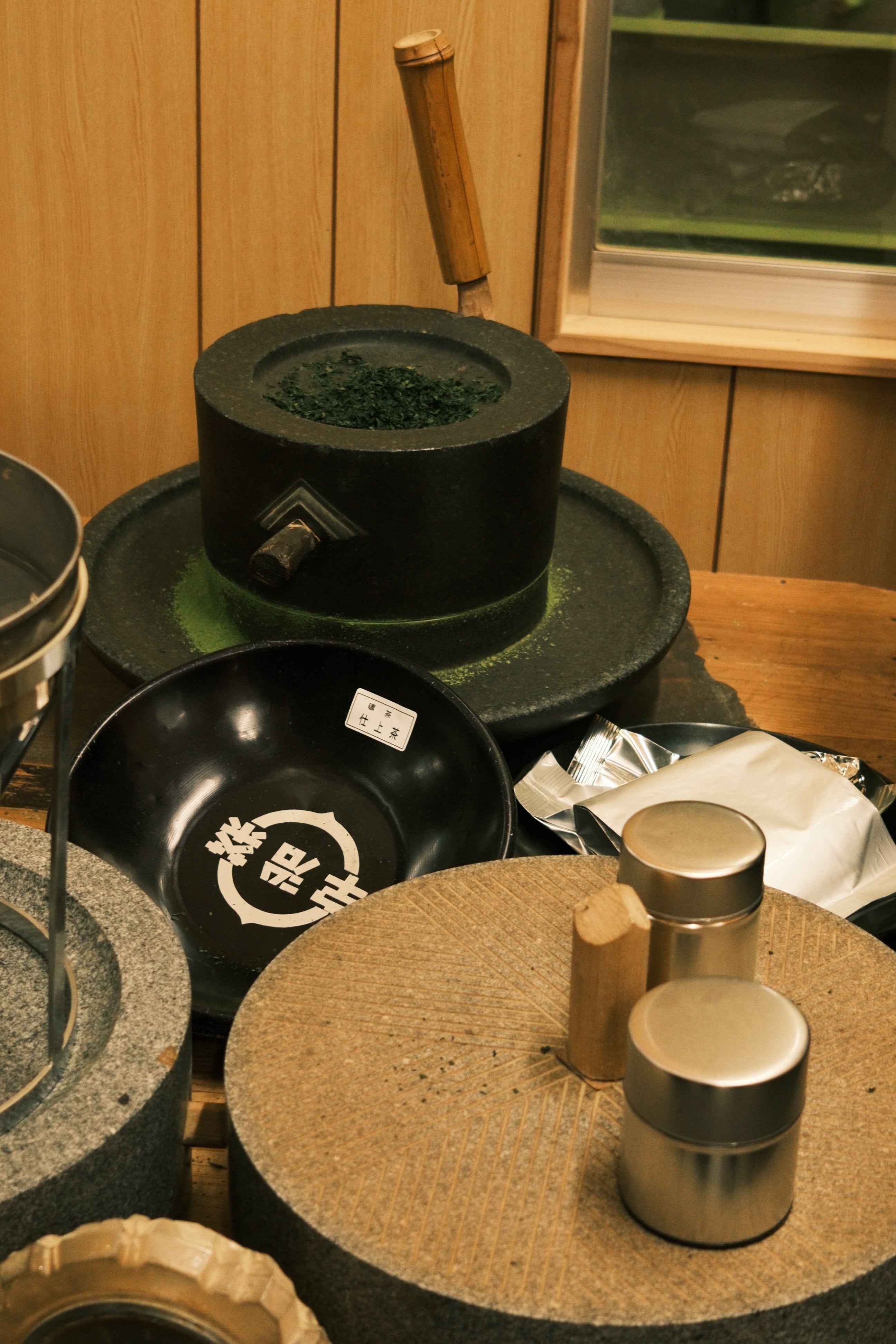 Uchi matcha related items including a matcha stone mill, japanese green tea matcha making in factory