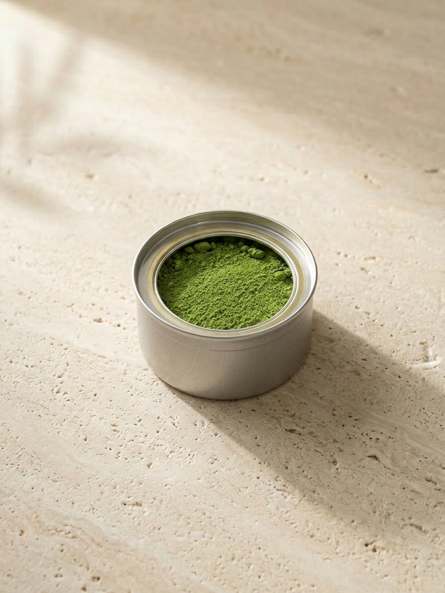 Uchi Pod close-up showing matcha inside. Matcha refill pod containing 40g of ceremonial grade matcha