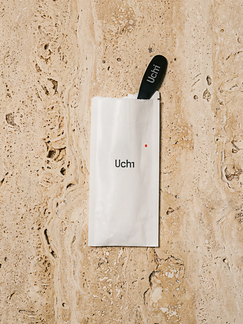 Uchi Matcha Spoon on a marble counter in packaging